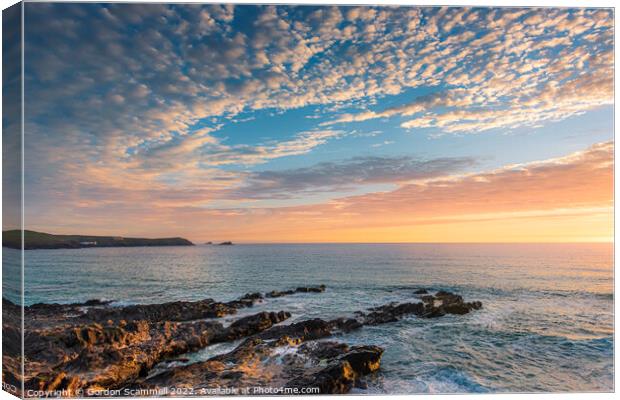 A golden sunset over Fistral Bay in Cornwall. Canvas Print by Gordon Scammell