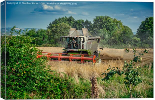 Combine Harvesting the Field Canvas Print by Stephen Pimm