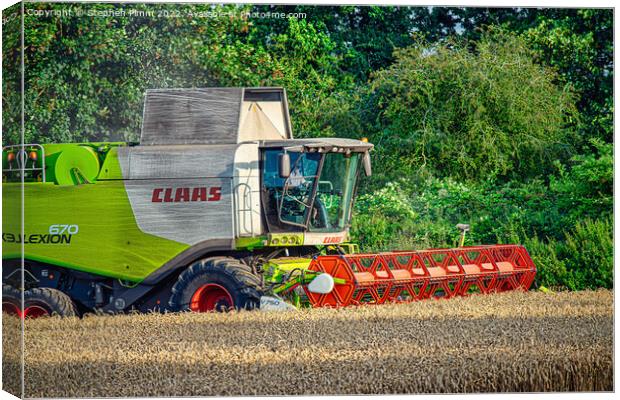 A Combine Harvesting the Field Canvas Print by Stephen Pimm