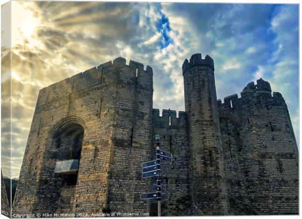 Caernarfon Castle sun rays  Canvas Print by Mike McMahon