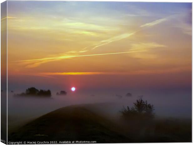 Sun Rising Above Morning Haze Canvas Print by Maciej Czuchra
