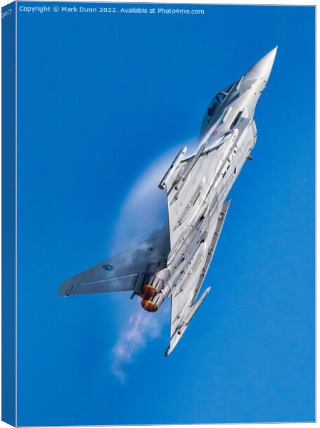 Military Jet Aircraft climbing with vapour on wings Canvas Print by Mark Dunn
