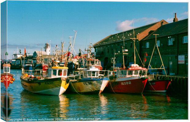 Bustling Fishing Harbor in Picturesque Scarbrough Canvas Print by Rodney Hutchinson