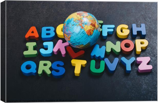 Abc wooden alphabet letters and globe for learning Canvas Print by Turgay Koca