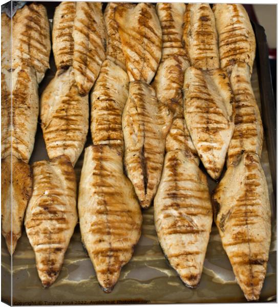 Fish on the grill as tasty seafood  Canvas Print by Turgay Koca