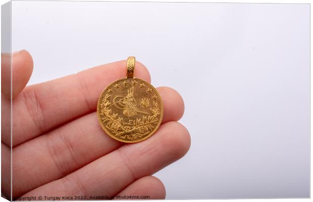 Turkish Ottoman style gold coin in hand Canvas Print by Turgay Koca