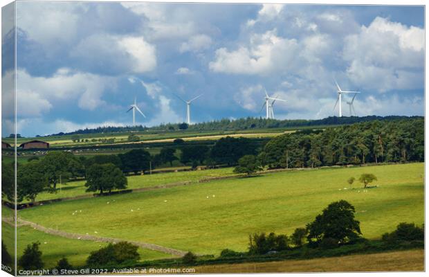 Wind Turbines on the Skyline of a Rural Landscape. Canvas Print by Steve Gill