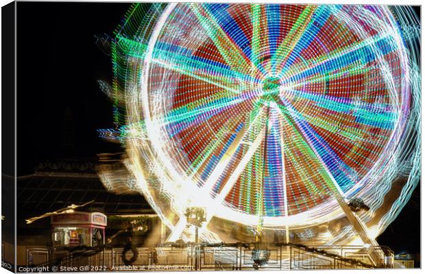 Ferris Wheel with Rotating kaleidoscopic Patterns. Canvas Print by Steve Gill