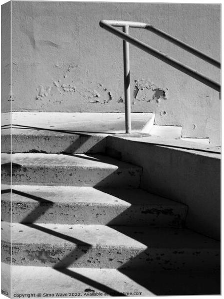 Abstract black and white detail of architecture in the street Canvas Print by Simo Wave