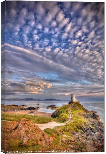 Llanddwyn lighthouse Anglesey  Canvas Print by Guy Brennan