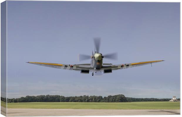 Spitfire, low level flypast Canvas Print by Simon Westwood