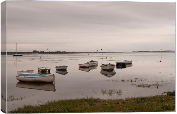 Dinghies afloat Canvas Print by Sally Wallis