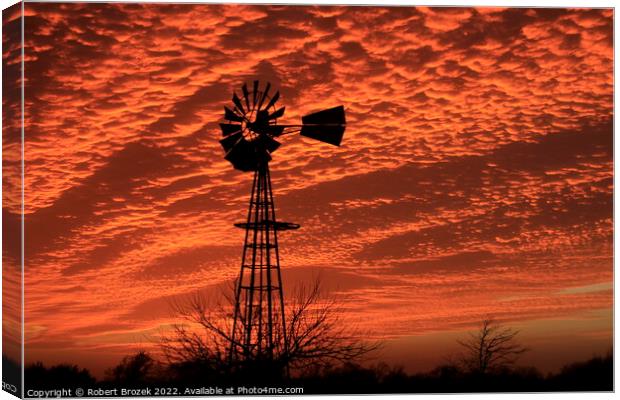 Kansas Sunset with a colorful sky and Windmill  Canvas Print by Robert Brozek