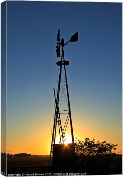 Kansas Windmill silhouette at Sunset Canvas Print by Robert Brozek
