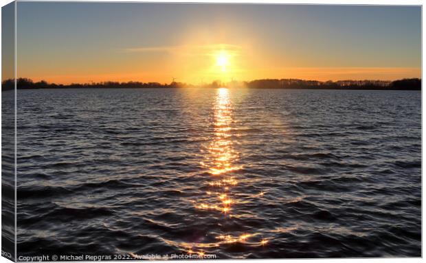 Beautiful and romantic sunset at a lake in yellow and orange col Canvas Print by Michael Piepgras