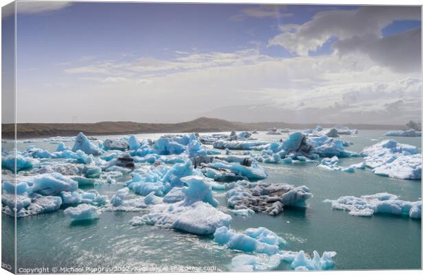 Iceland, Jokulsarlon Lagoon, Turquoise icebergs floating in Glac Canvas Print by Michael Piepgras