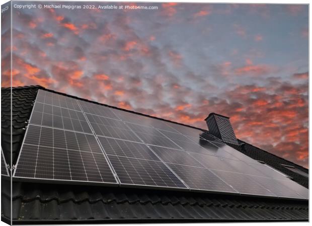 Solar panels producing clean energy on a roof of a residential h Canvas Print by Michael Piepgras