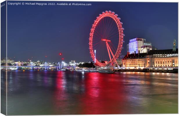 River Thamse with light reflections and the London Eye ferris wheel at night Canvas Print by Michael Piepgras