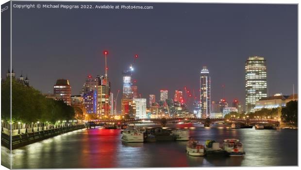 View at the River Thames in the city of London at night Canvas Print by Michael Piepgras