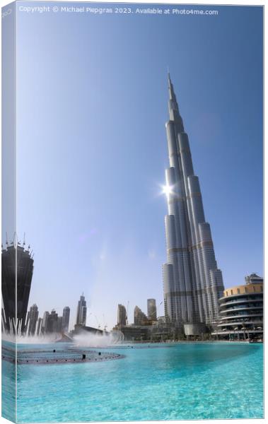 View at the Burj Khalifa on a sunny day. Burj Khalifa is currently the tallest building in the world, at 829.84 m (2,723 ft) Canvas Print by Michael Piepgras