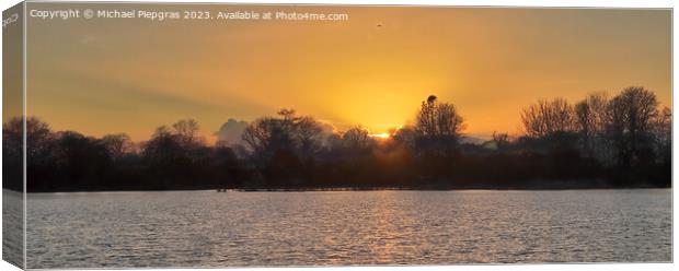 Beautiful and romantic sunset at a lake in yellow and orange col Canvas Print by Michael Piepgras