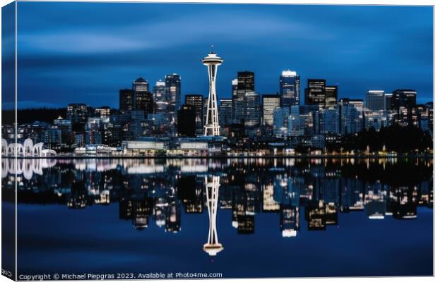 A skyline of a big city in the night with water reflections. Canvas Print by Michael Piepgras