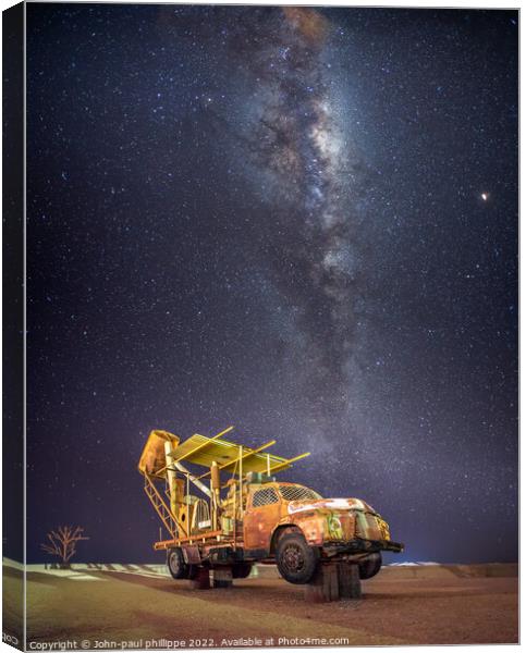 Old vintage mining truck under the Milky Way Canvas Print by John-paul Phillippe