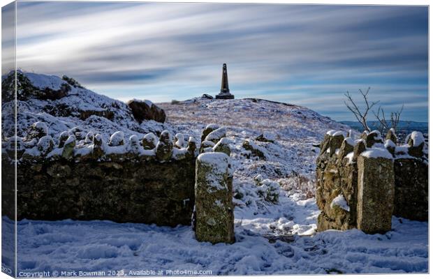 Snow Covered Monument Canvas Print by Mark Bowman