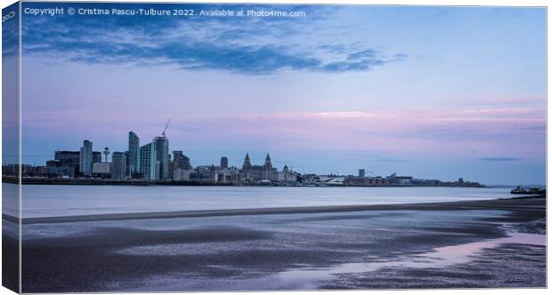 Liverpool waterfront from Egremont at dusk Canvas Print by Cristina Pascu-Tulbure
