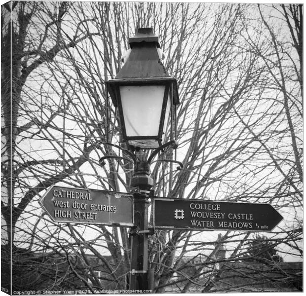 Winchester Lampost and Signs Canvas Print by Stephen Young