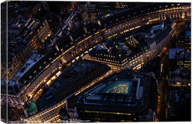 Aerial illuminated London view of Piccadilly Circus UK Canvas Print by Spotmatik 