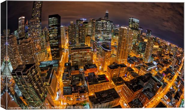 Aerial wide angle night view illuminated Chicago skyline  Canvas Print by Spotmatik 
