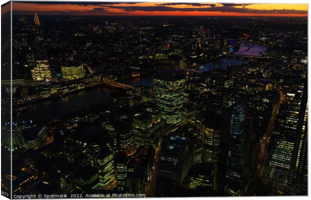 Aerial London illuminated night view financial business center  Canvas Print by Spotmatik 