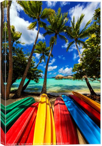 Bora Bora kayak boats Overwater Bungalows tropical lagoon  Canvas Print by Spotmatik 