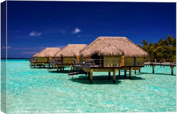 Bora Bora luxury holiday resort with Overwater Bungalows  Canvas Print by Spotmatik 
