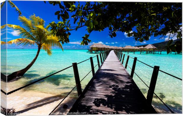 Bora Bora Island walkway jetty Overwater luxury Bungalows  Canvas Print by Spotmatik 