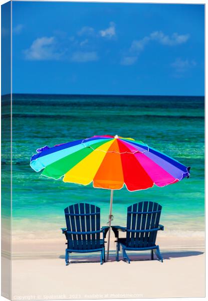 Holiday travel resort chairs with beach sun umbrella  Canvas Print by Spotmatik 