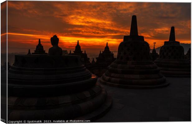 Asian sunrise Borobudur temple to Buddhism Hinduism Indonesia Canvas Print by Spotmatik 