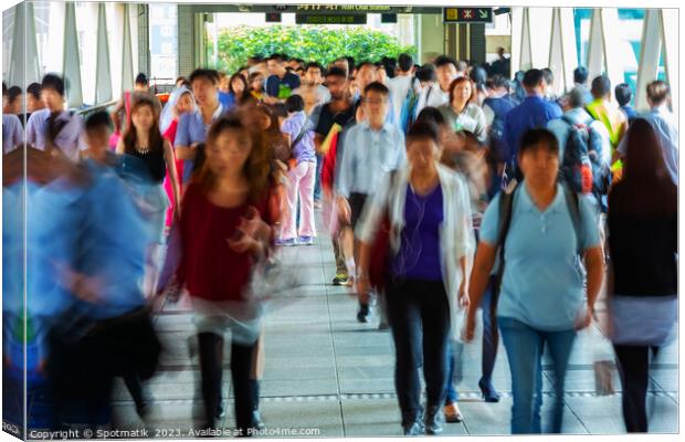 Asian city commuters walking to work Hong Kong Canvas Print by Spotmatik 