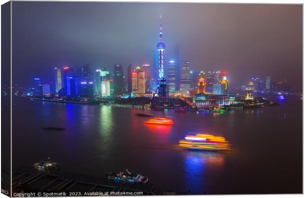 Illuminated Huangpu River Shanghai and Oriental Pe Canvas Print by Spotmatik 