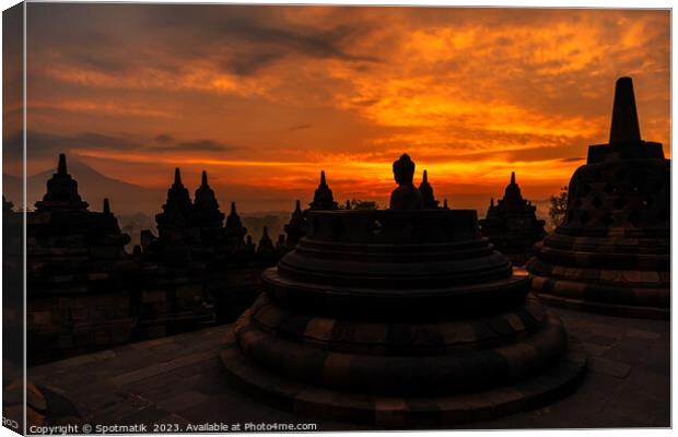 View at sunrise of Borobudur religious temple Java  Canvas Print by Spotmatik 