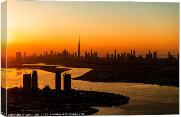 Aerial Dubai sunset a famous travel tourism destination  Canvas Print by Spotmatik 