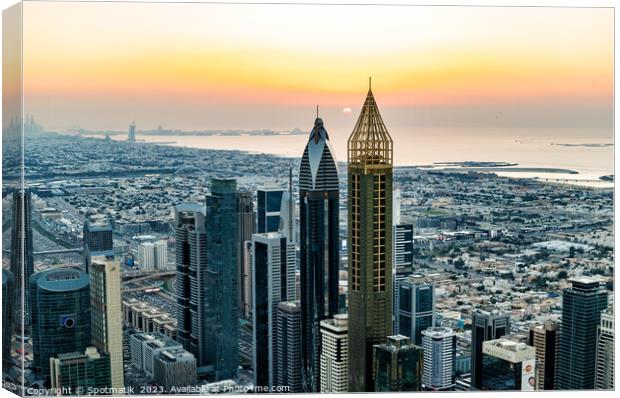 Aerial Dubai sunset Persian Gulf coastline skyscrapers UAE Canvas Print by Spotmatik 