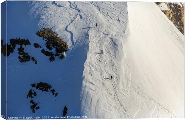 Aerial Switzerland mountain team climbing snow face Europe Canvas Print by Spotmatik 