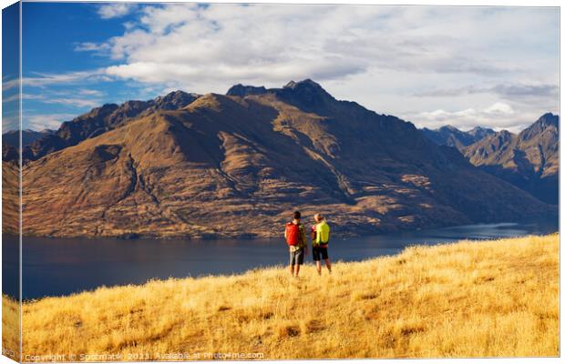 Young Couple Backpackers outdoor hiking The Remarkables Canvas Print by Spotmatik 