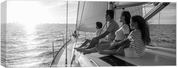 Panorama of Latin American family on sailing vacation at sunset Canvas Print by Spotmatik 