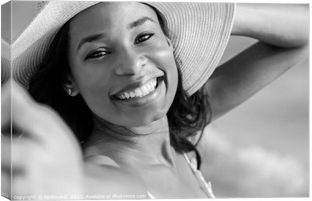 Portrait of smiling African American girl wearing hat Canvas Print by Spotmatik 