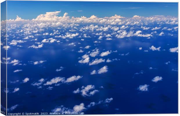 Aerial cloudscape of French Polynesia Pacific ocean seascape  Canvas Print by Spotmatik 