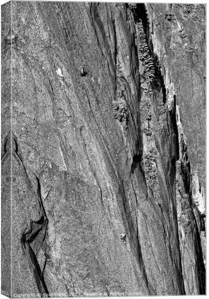 Aerial male rock climber cliff face Squamish Canada Canvas Print by Spotmatik 