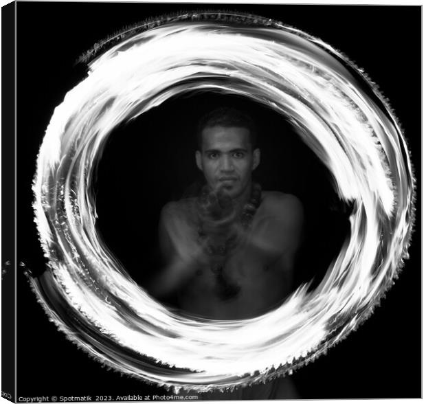 Male Polynesian Fire dancer performing Ring of Fire  Canvas Print by Spotmatik 